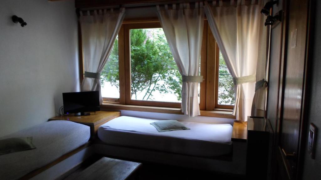 Apart Hotel Robles Del Sur San Martín de los Andes Стая снимка